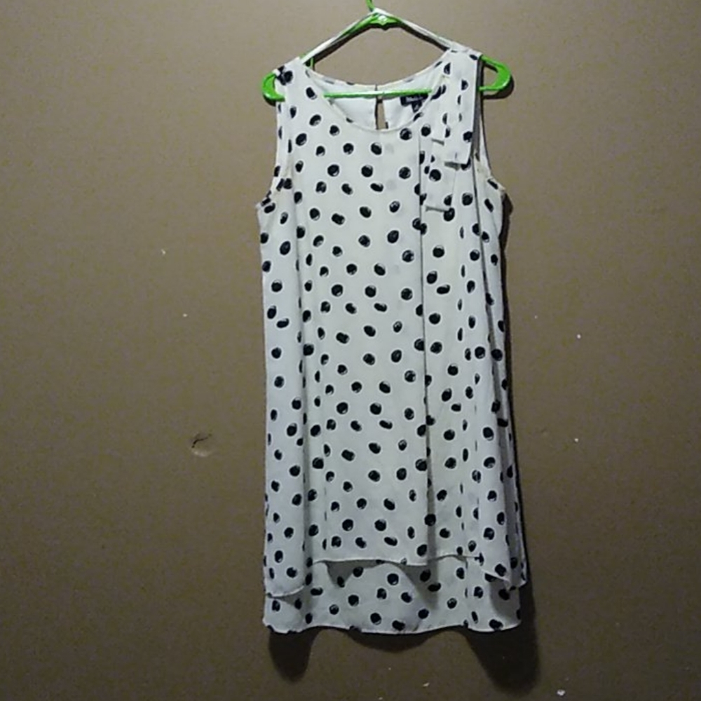 White dress with black pock a dots.